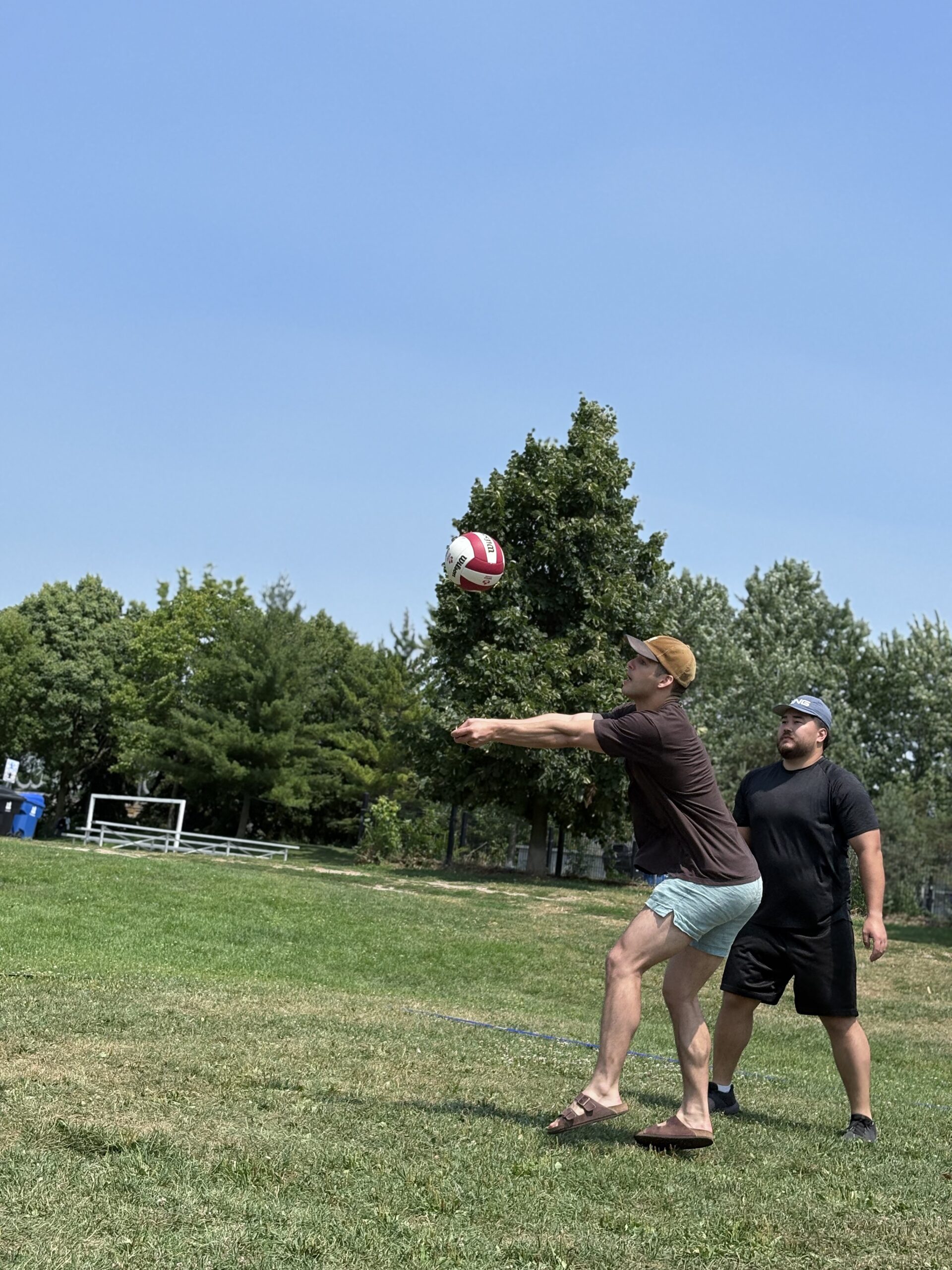 A volleyball game on the green space at Sorauren Park