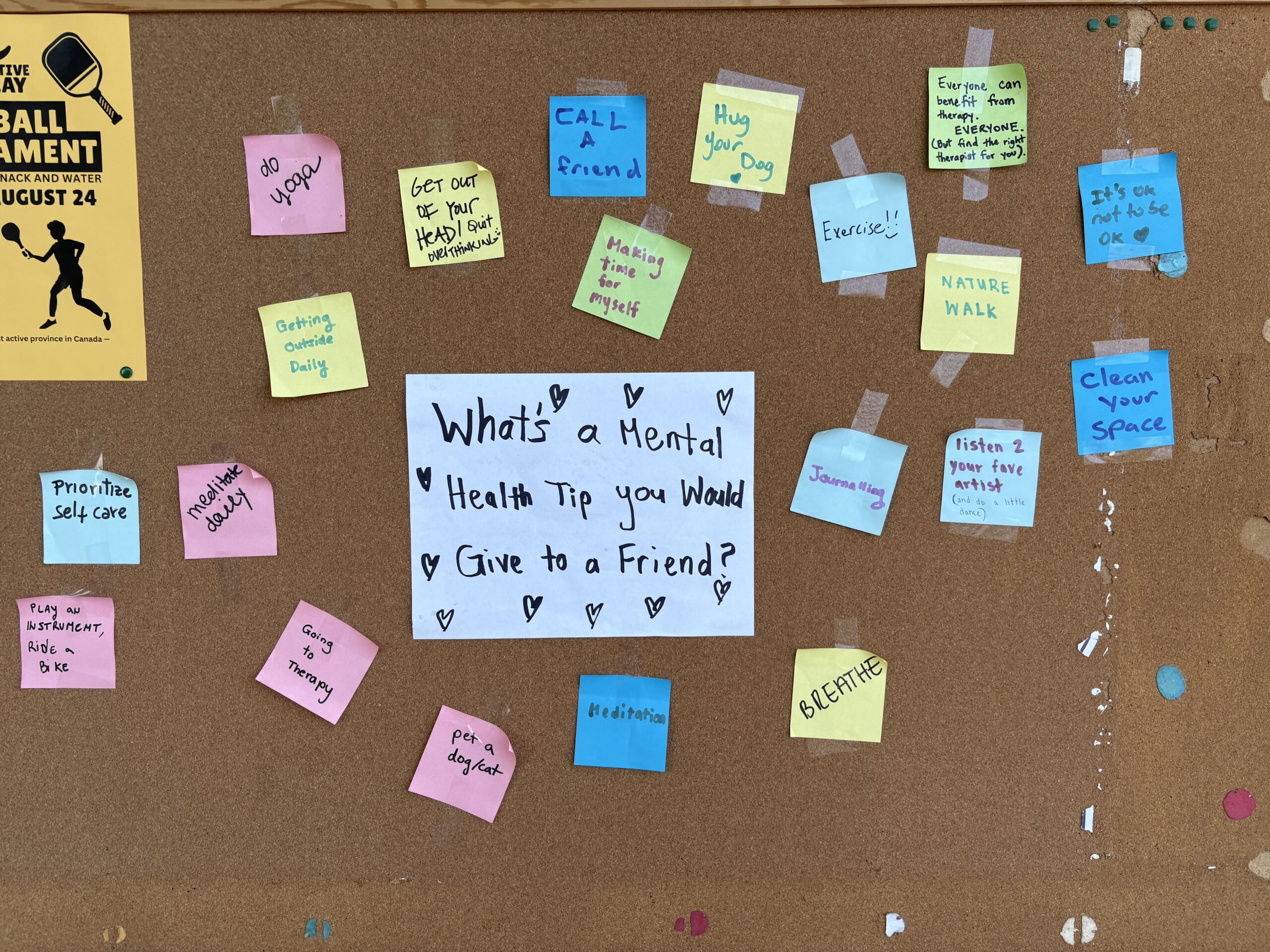 The completed community mental-health tip board, covered in handwritten notes