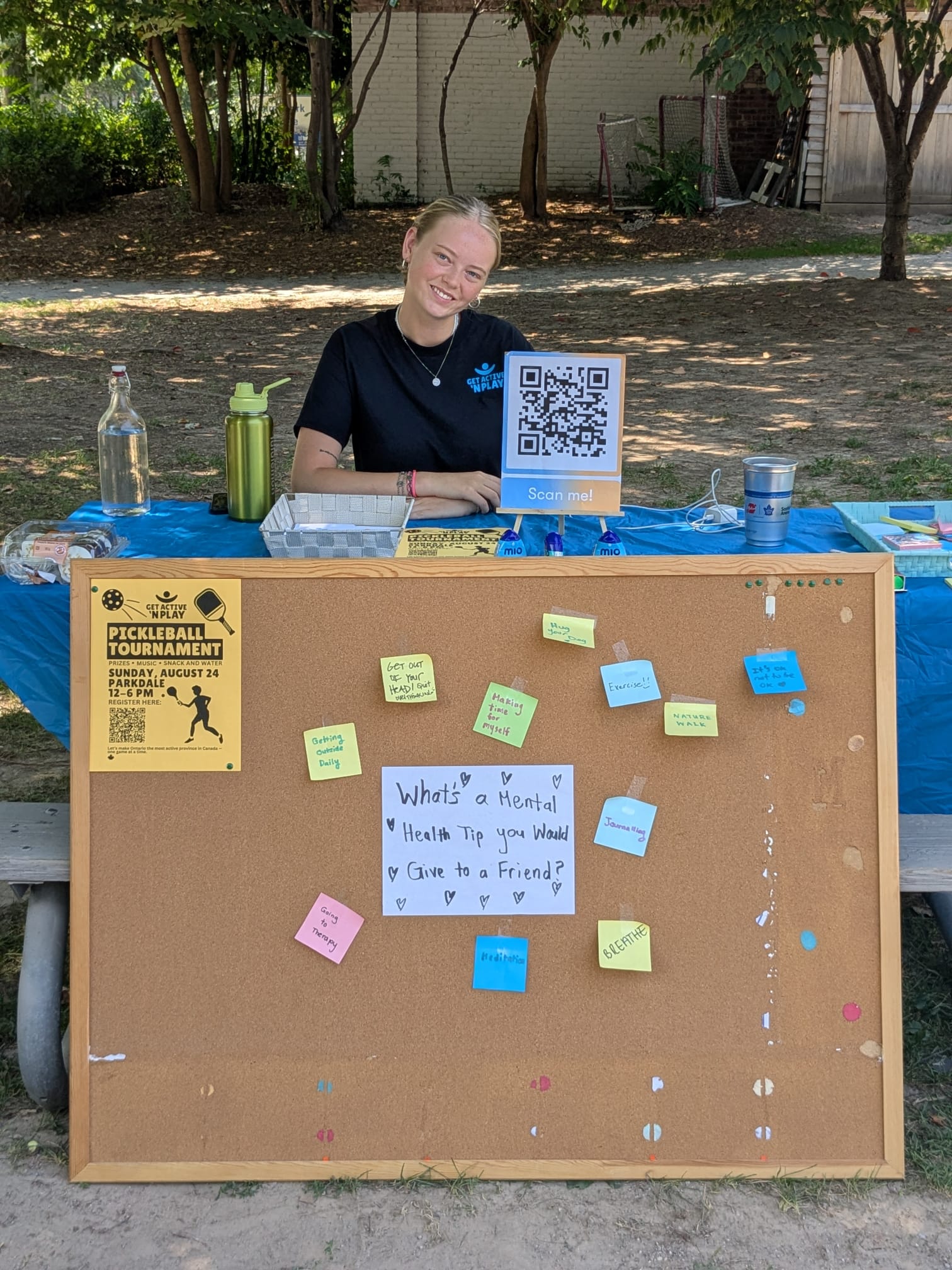 A GANP volunteer at the community mental-health table