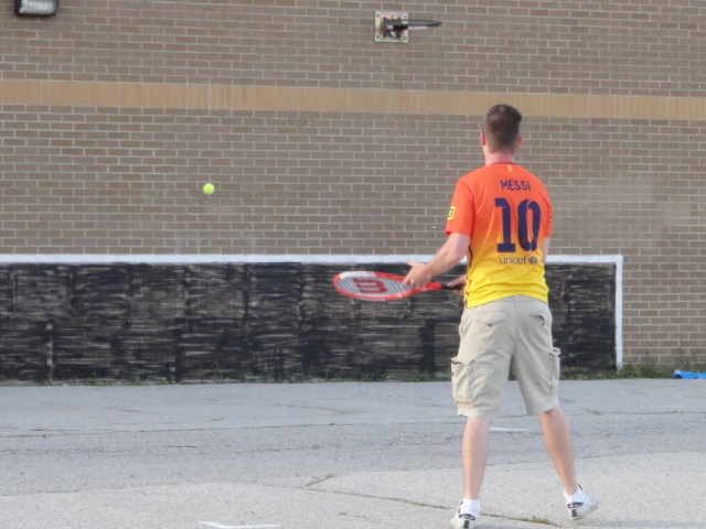A tennis Sportswall painted on a Markham school wall
