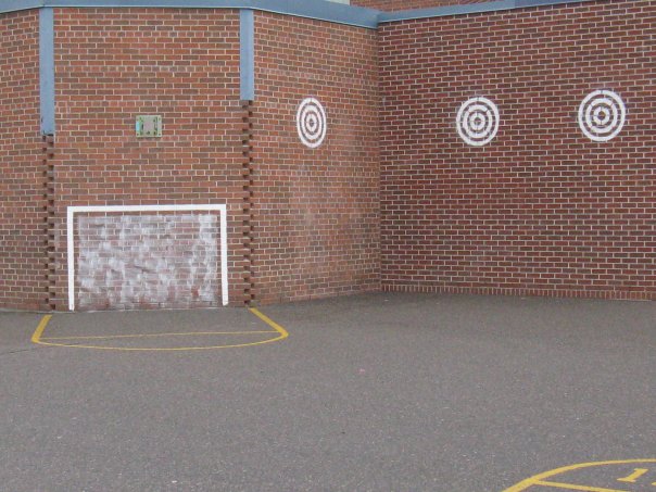 An early white Sportswall with a painted goal and targets